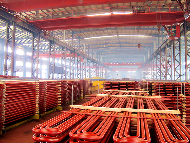 Tube bending and coil formation